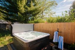 Northern Sky Cottages | 8BR | 4BA | 2 Hot Tubs | Game Shed & Private Yard
